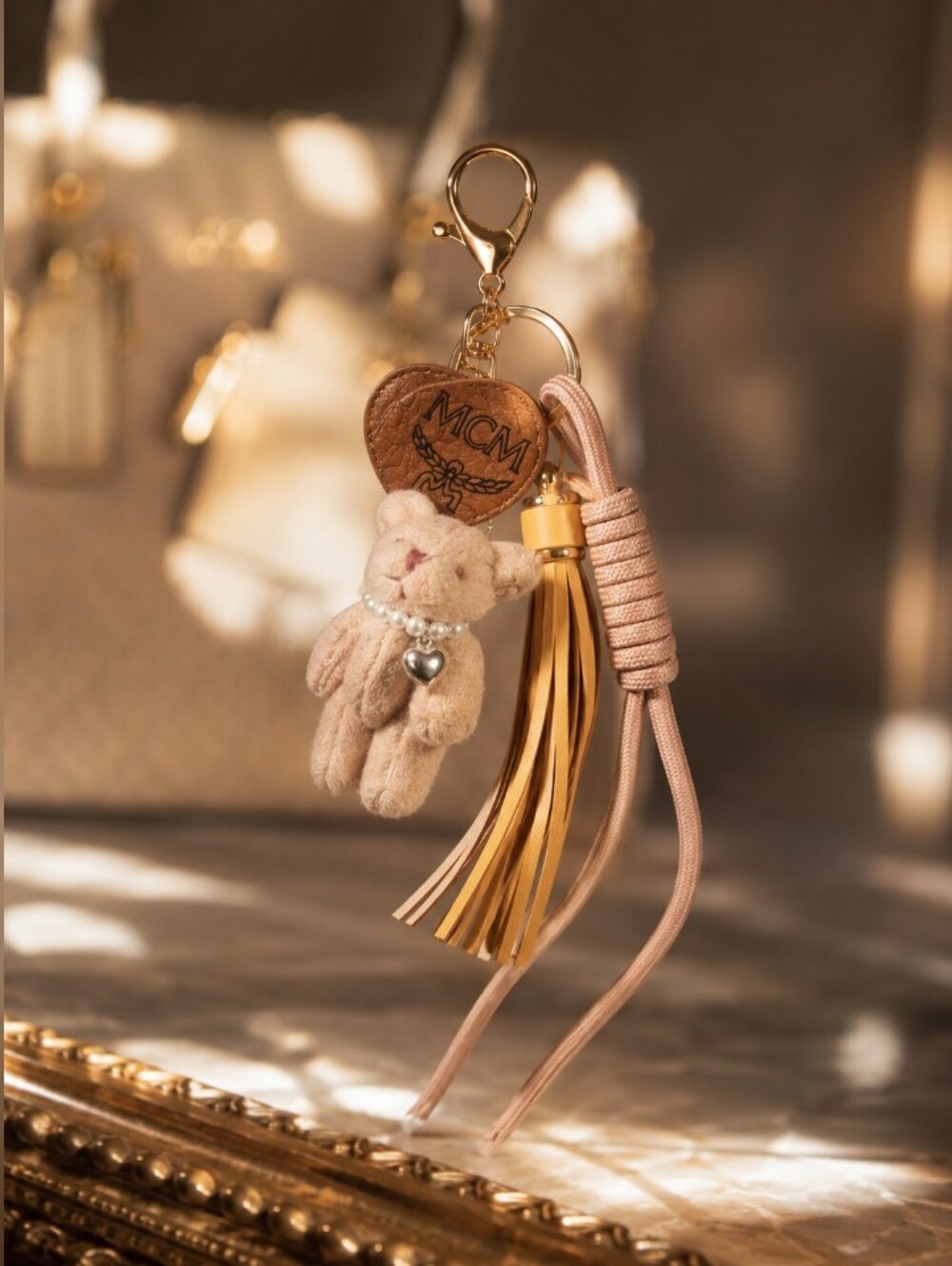 MCM Leather Tassel & Bear Keychain Charm in Tan and Yellow